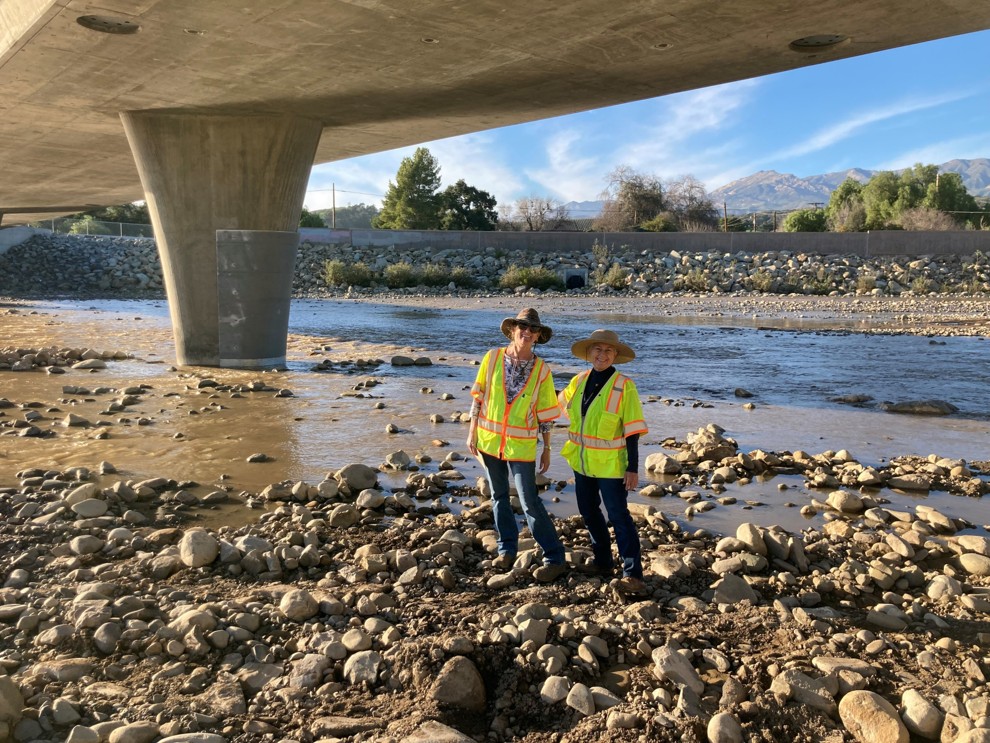 Two PWA Employees posing in a water way.